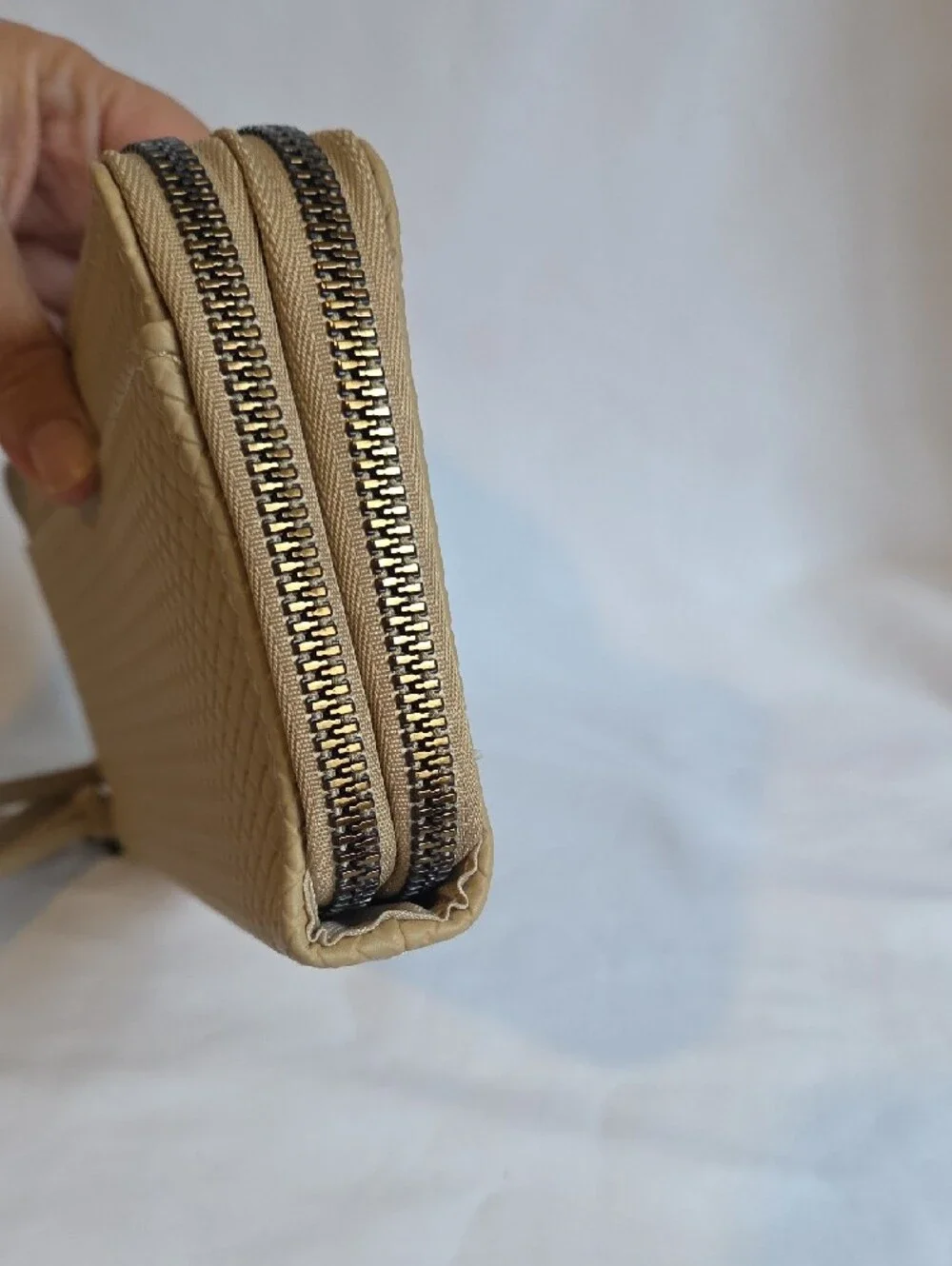 Safe Keeper Beige Textured Woven Zip Around Wristlet Wallet.